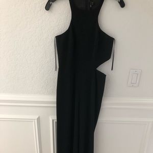 Jumpsuit with sexy side cutout.